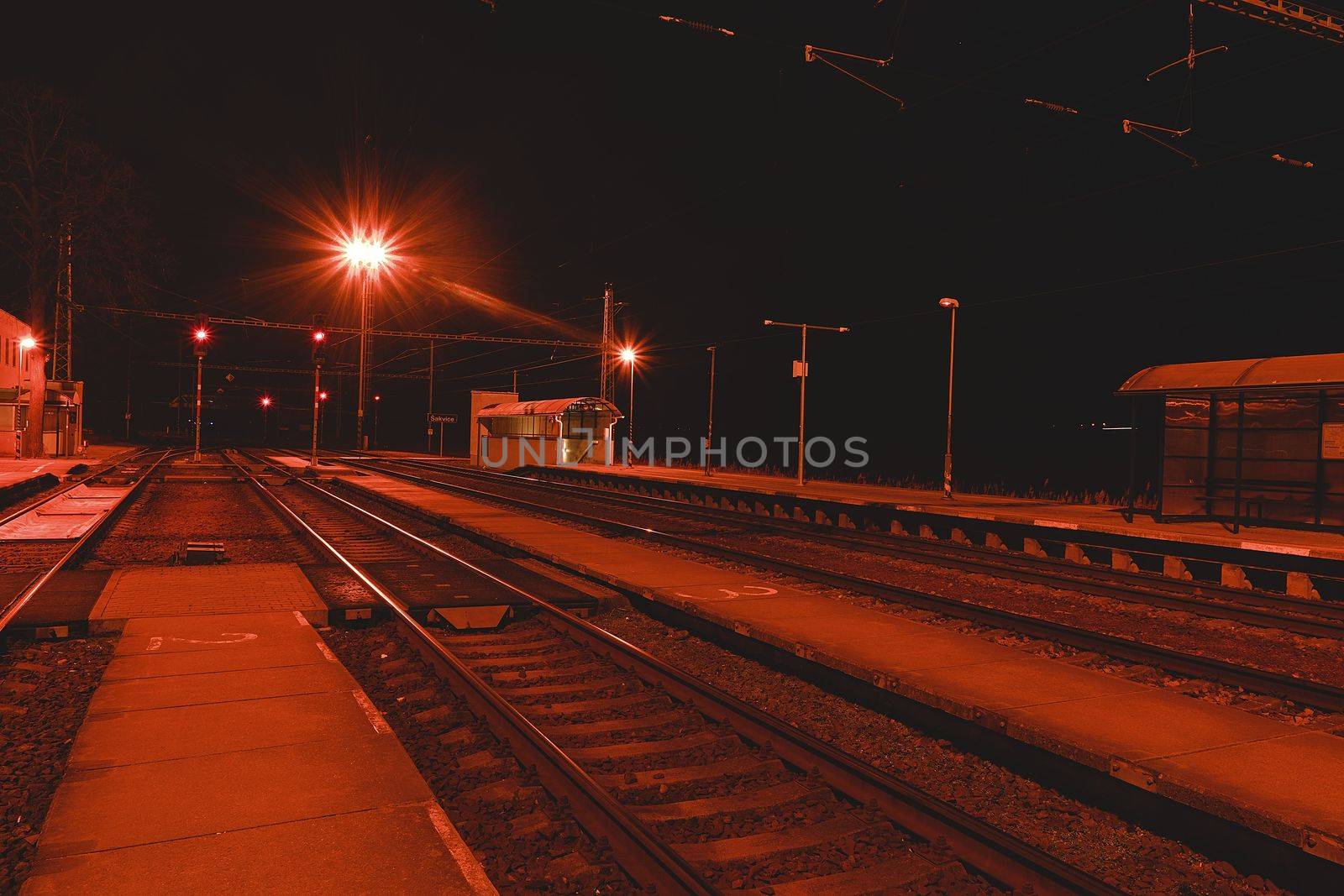 Railway station at the night. European railway station. by roman_nerud