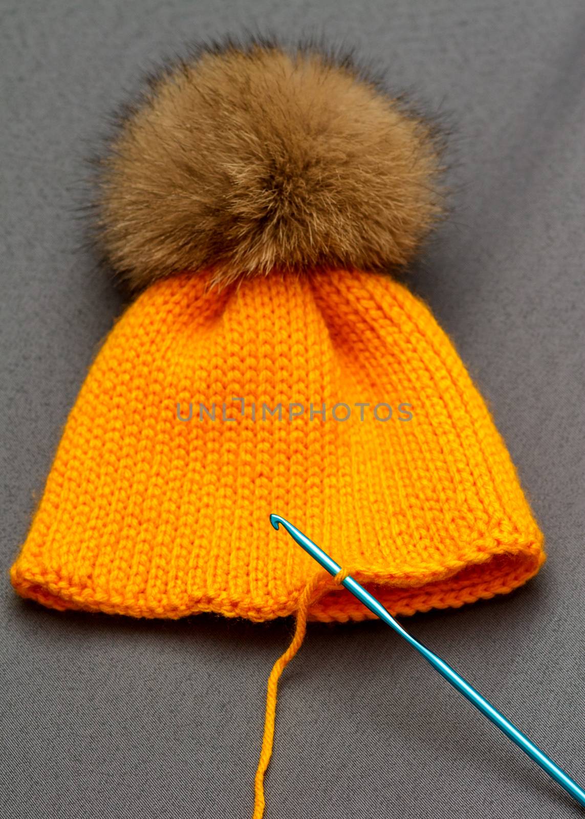 Orange handmade hat by fogen