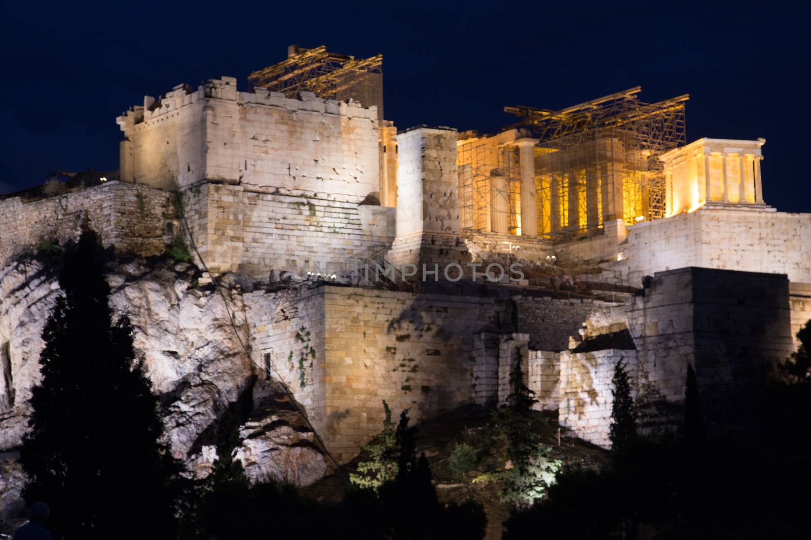 The Acropolis and Parthenon at night in Athens, Greece