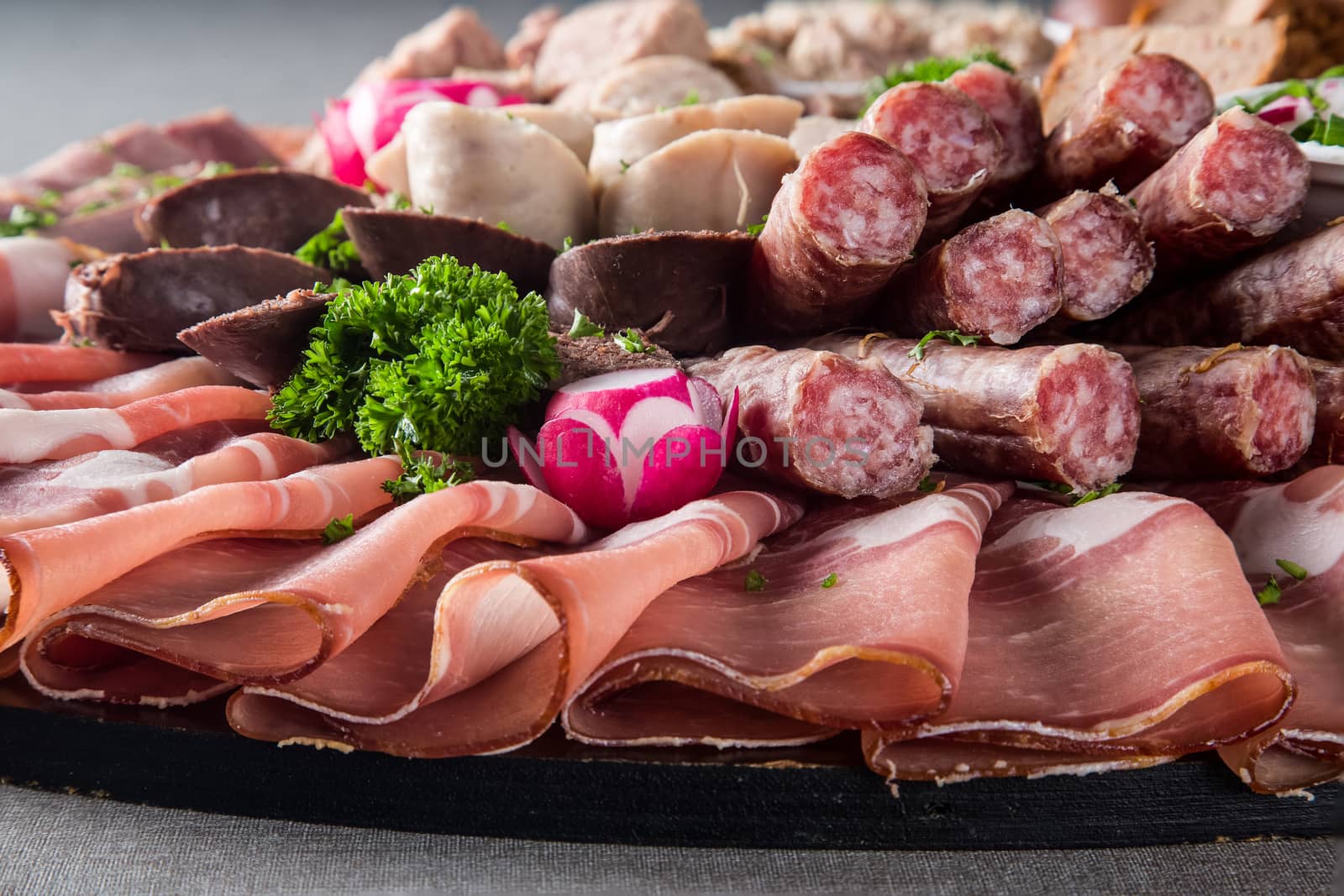 Assortment of meat delicatessen on a plate