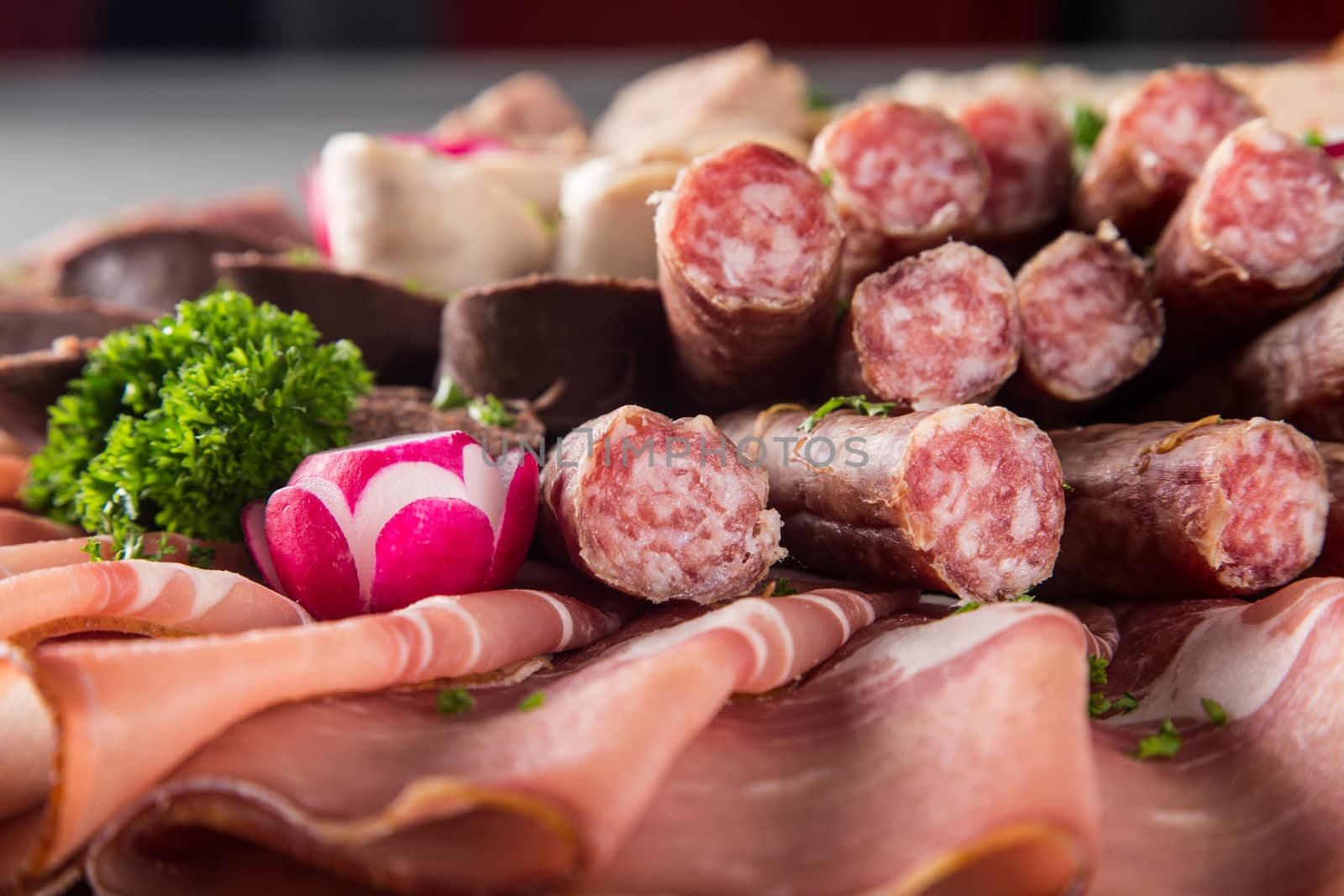 Assortment of meat delicatessen on a plate