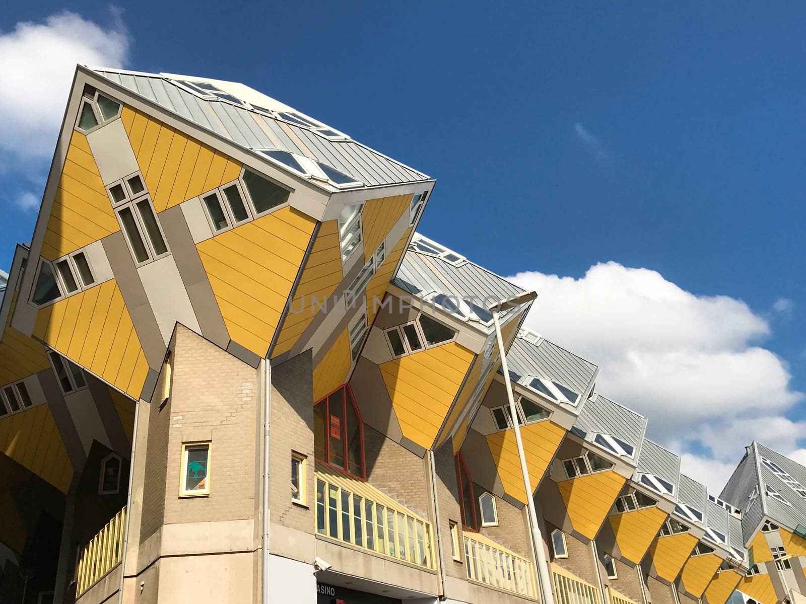Yellow Cube houses by Kartouchken