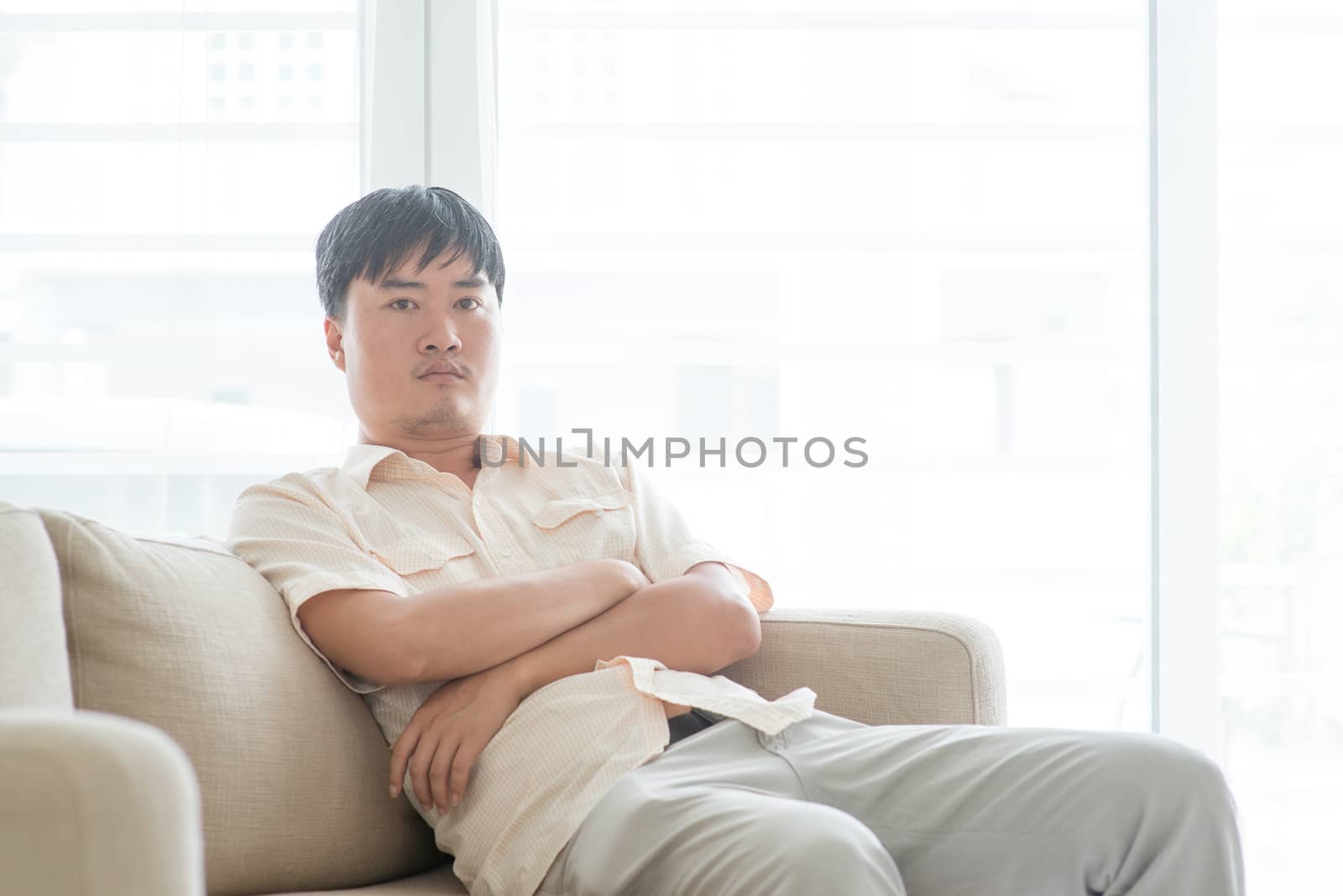 Portrait of Asian mature man at home, people indoor lifestyle.