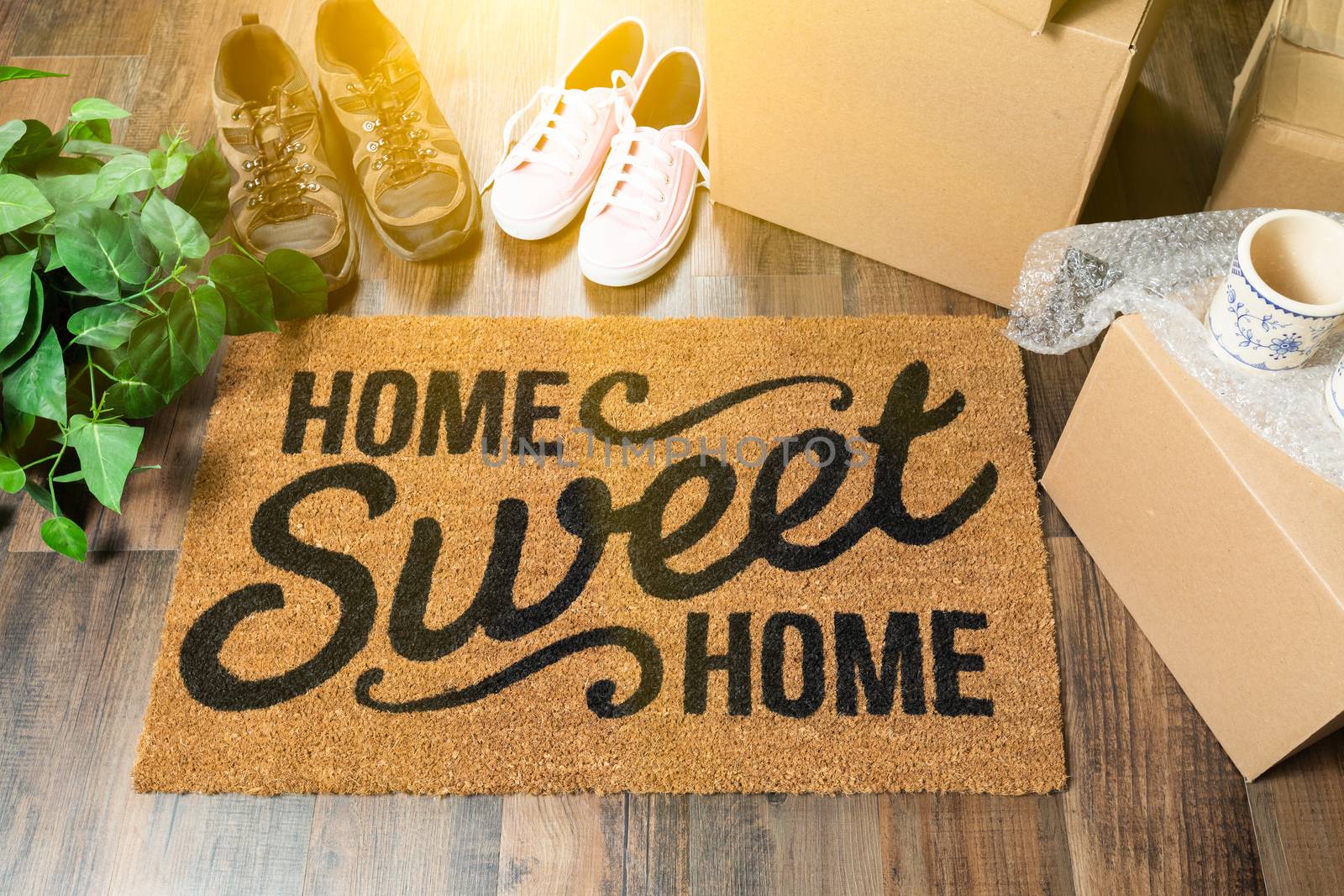 Home Sweet Home Welcome Mat, Moving Boxes, Women and Male Shoes  by Feverpitched