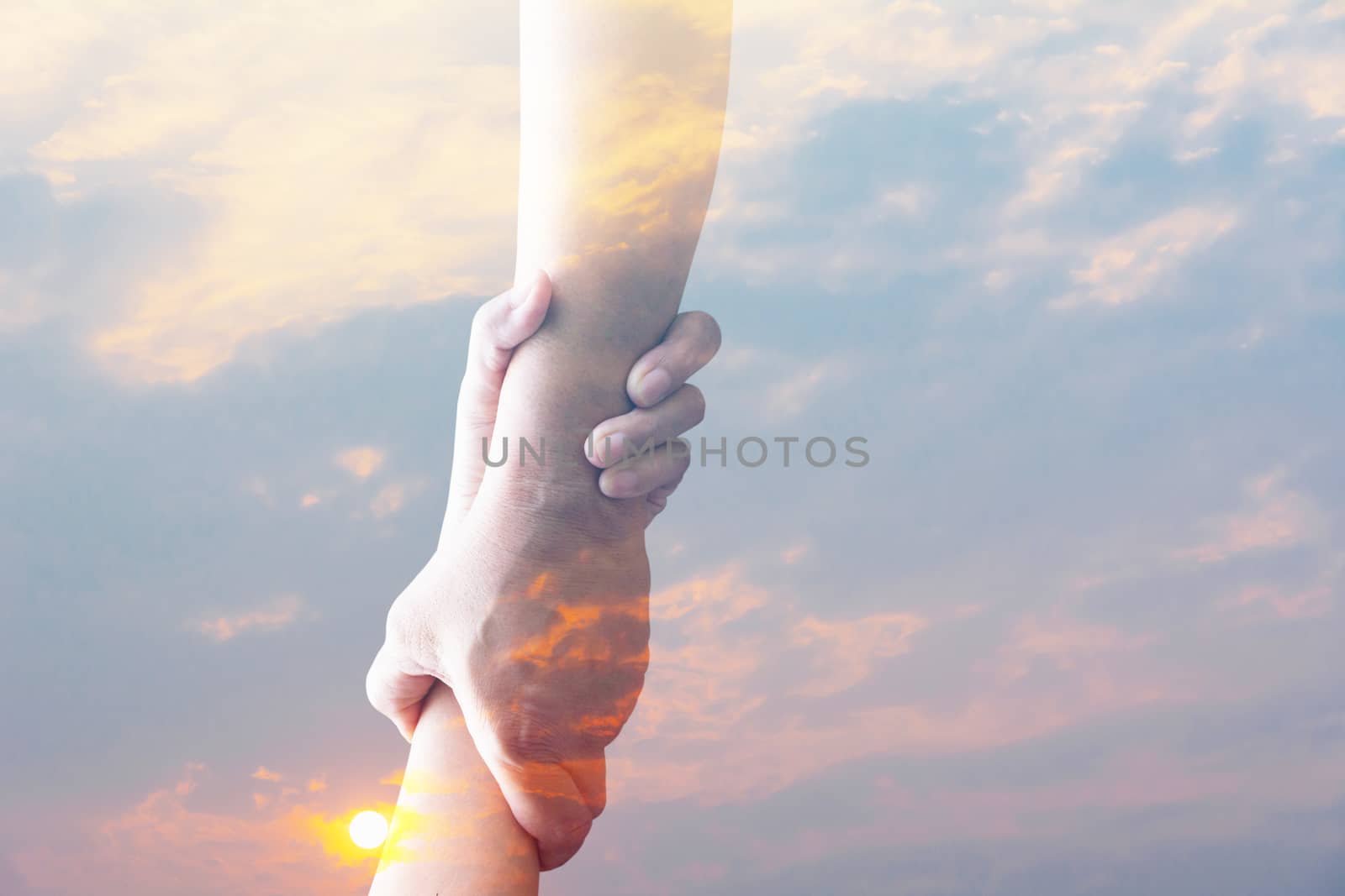 Two pairs of hand touch together, helping hands concept. Helping hand outstretched for help.