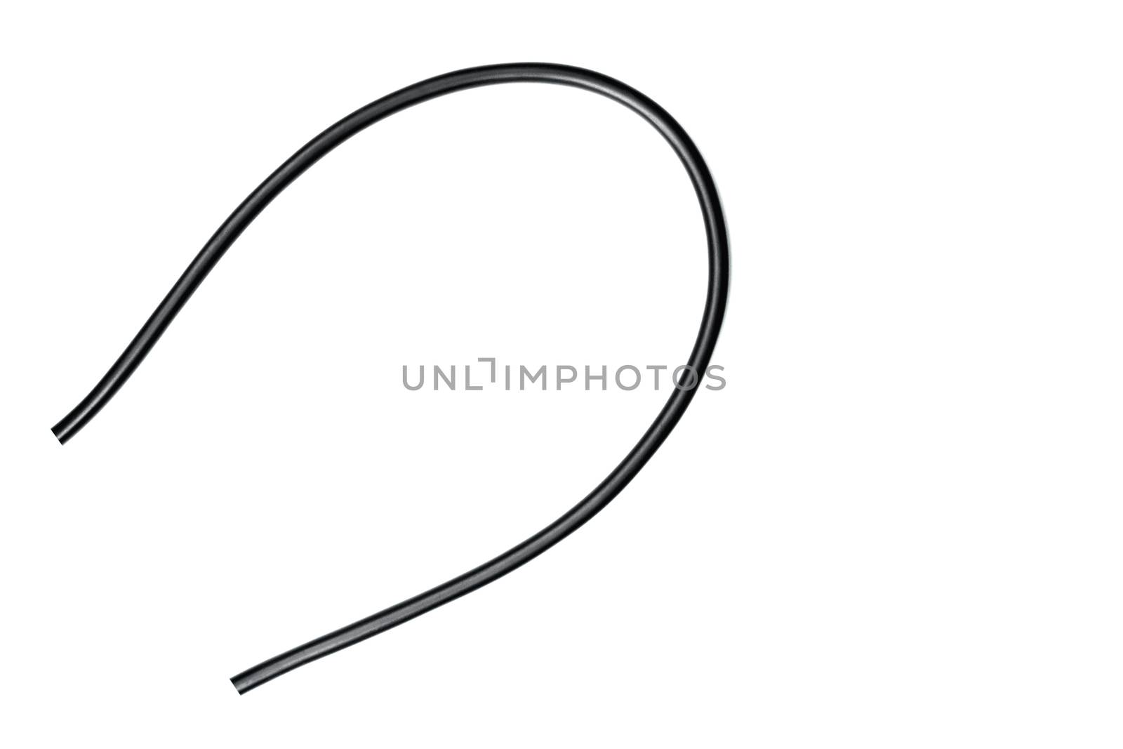 Black wire cable isolated on a white background abstraction.