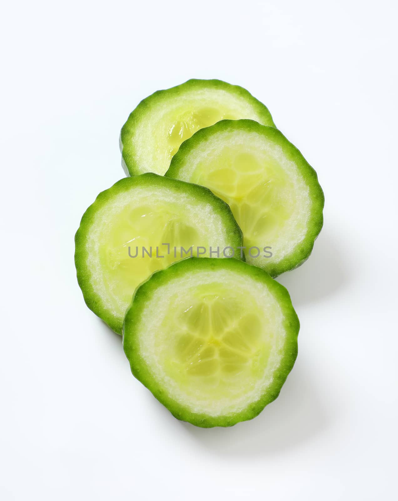slices of green cucumber by Digifoodstock