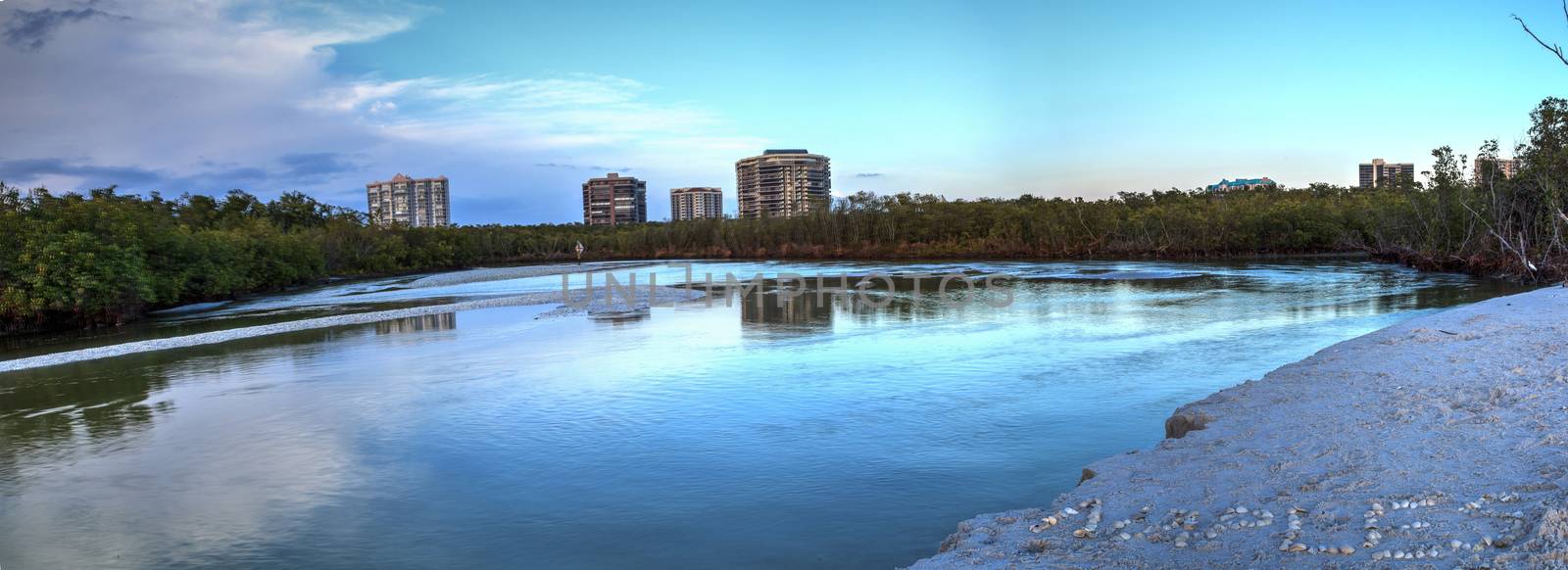 River leading to the ocean at Clam Pass at dusk in Naples, Florida