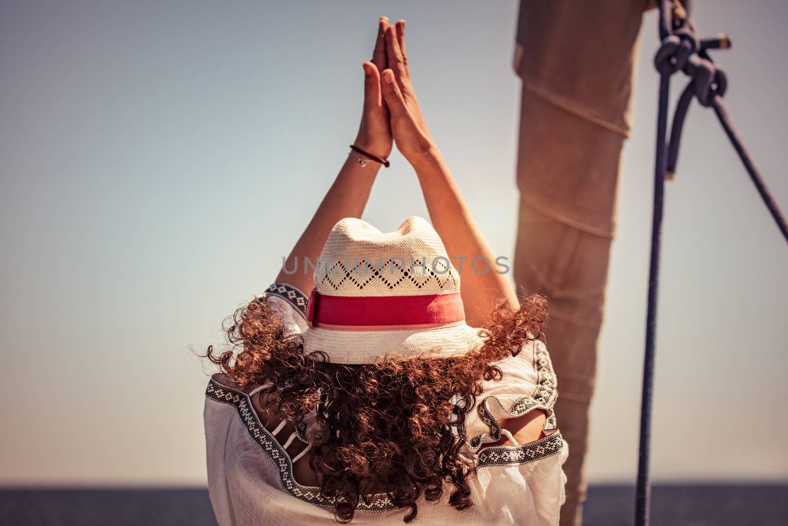 Woman doing yoga exercises by Anna_Omelchenko