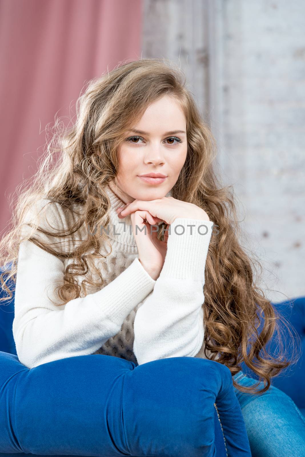 charming woman with long curly locks posing indoors by kosmsos111