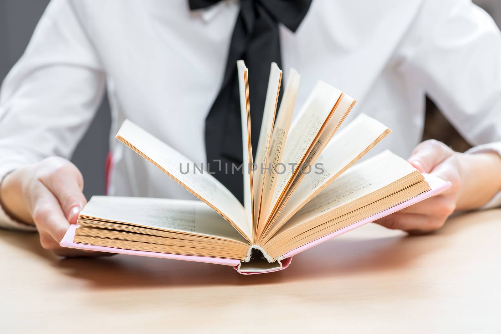 romance in female hands close-up, focus on book by kosmsos111