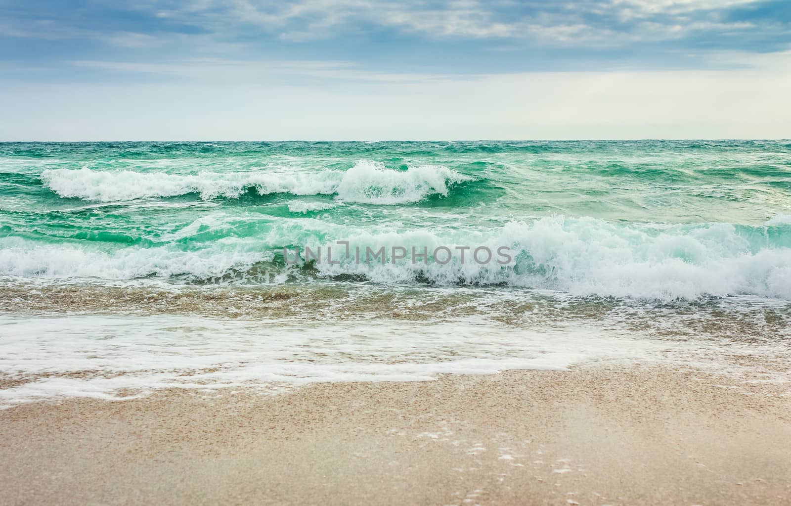crushing waves on sandy beach by Pellinni
