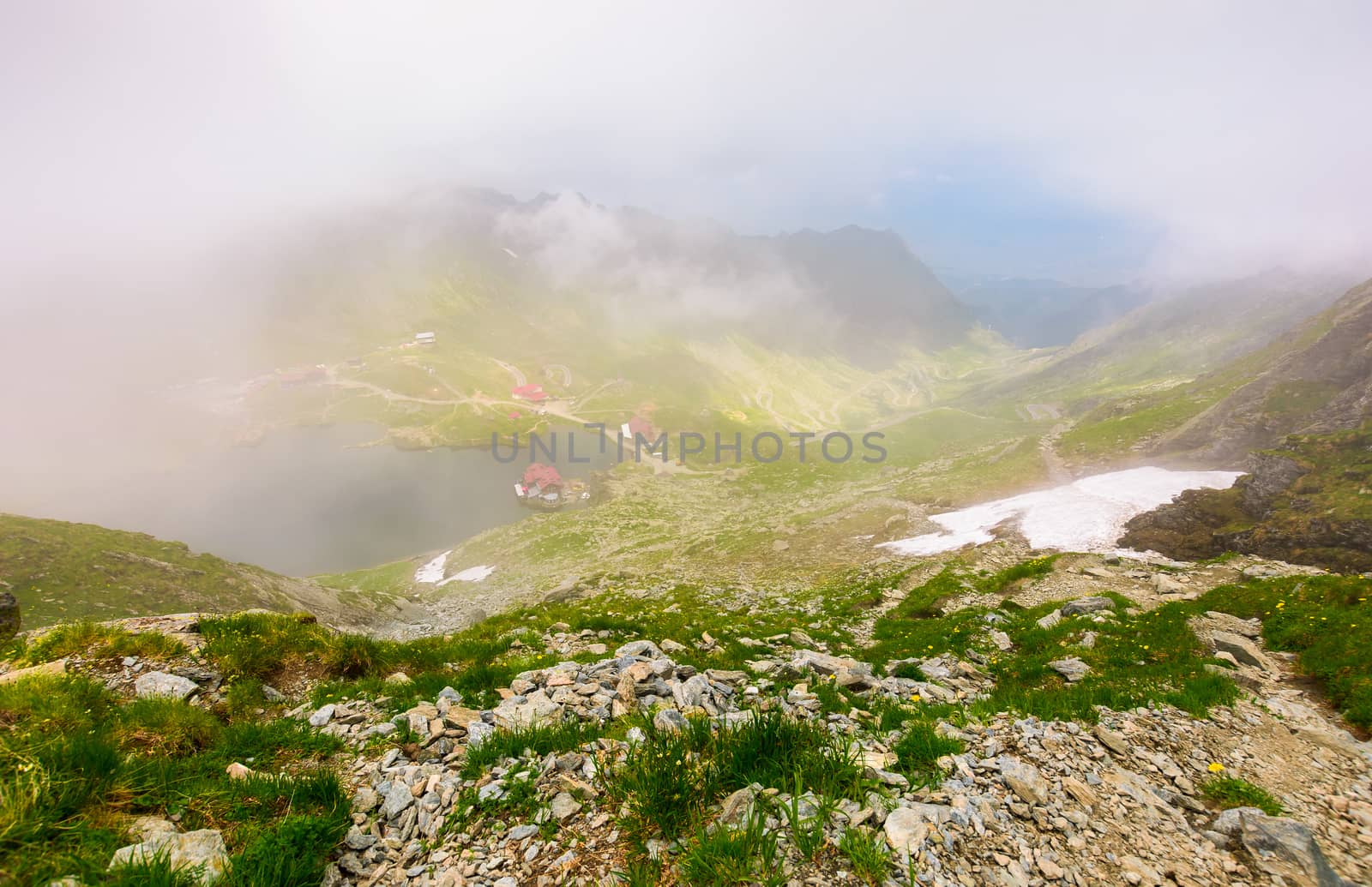 Balea lake in fog view from the top by Pellinni