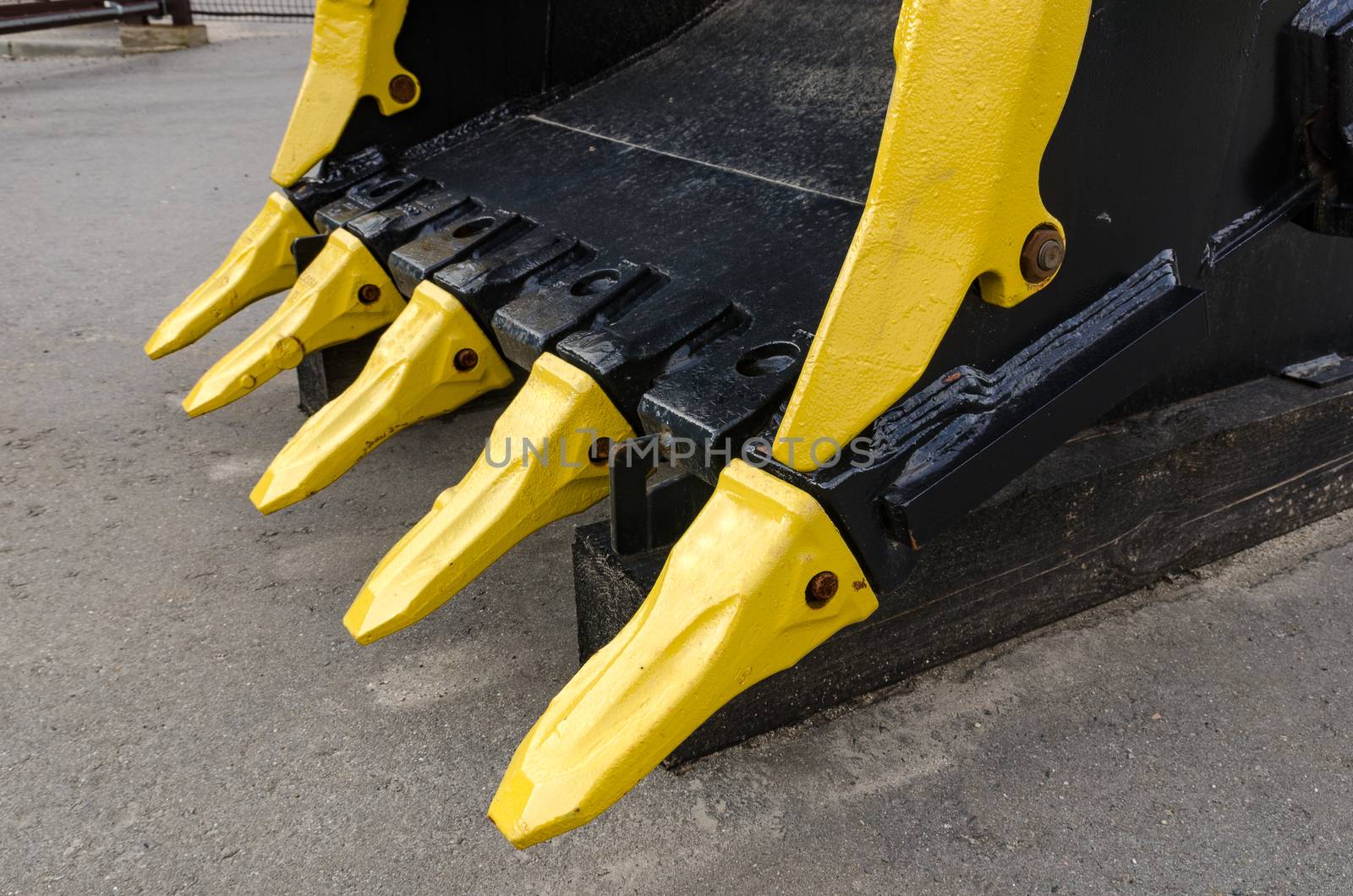 New road-construction equipment outdoors on the exhibition