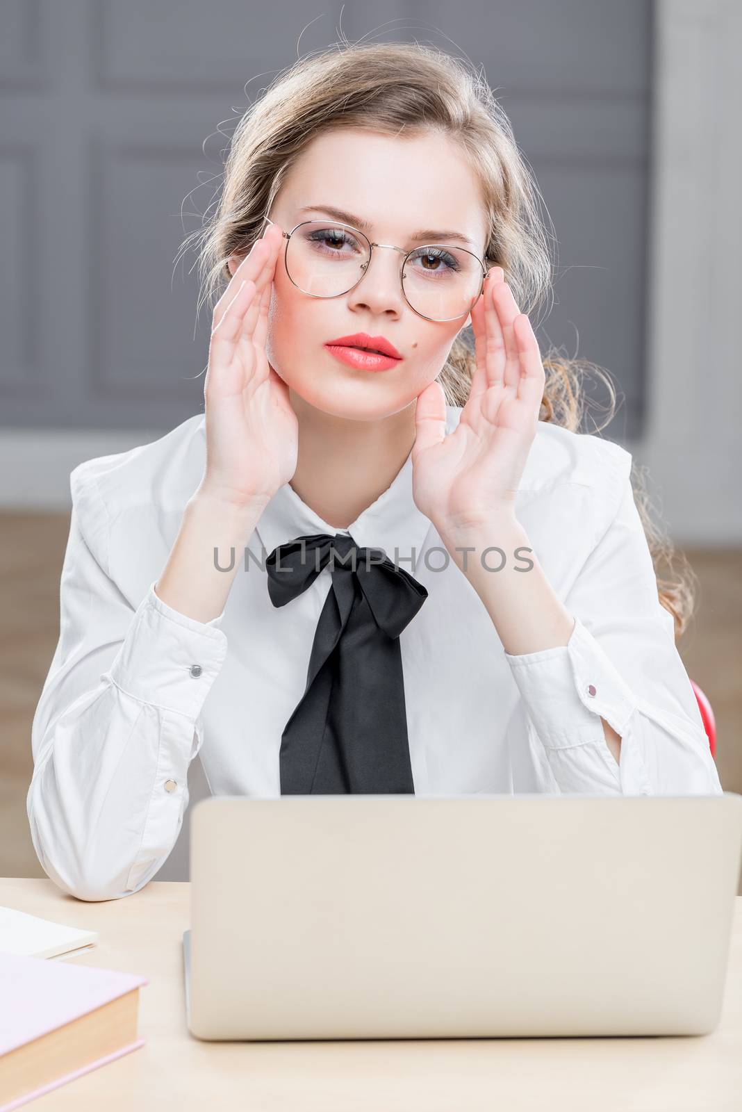 vertical portrait of businesswoman wearing glasses