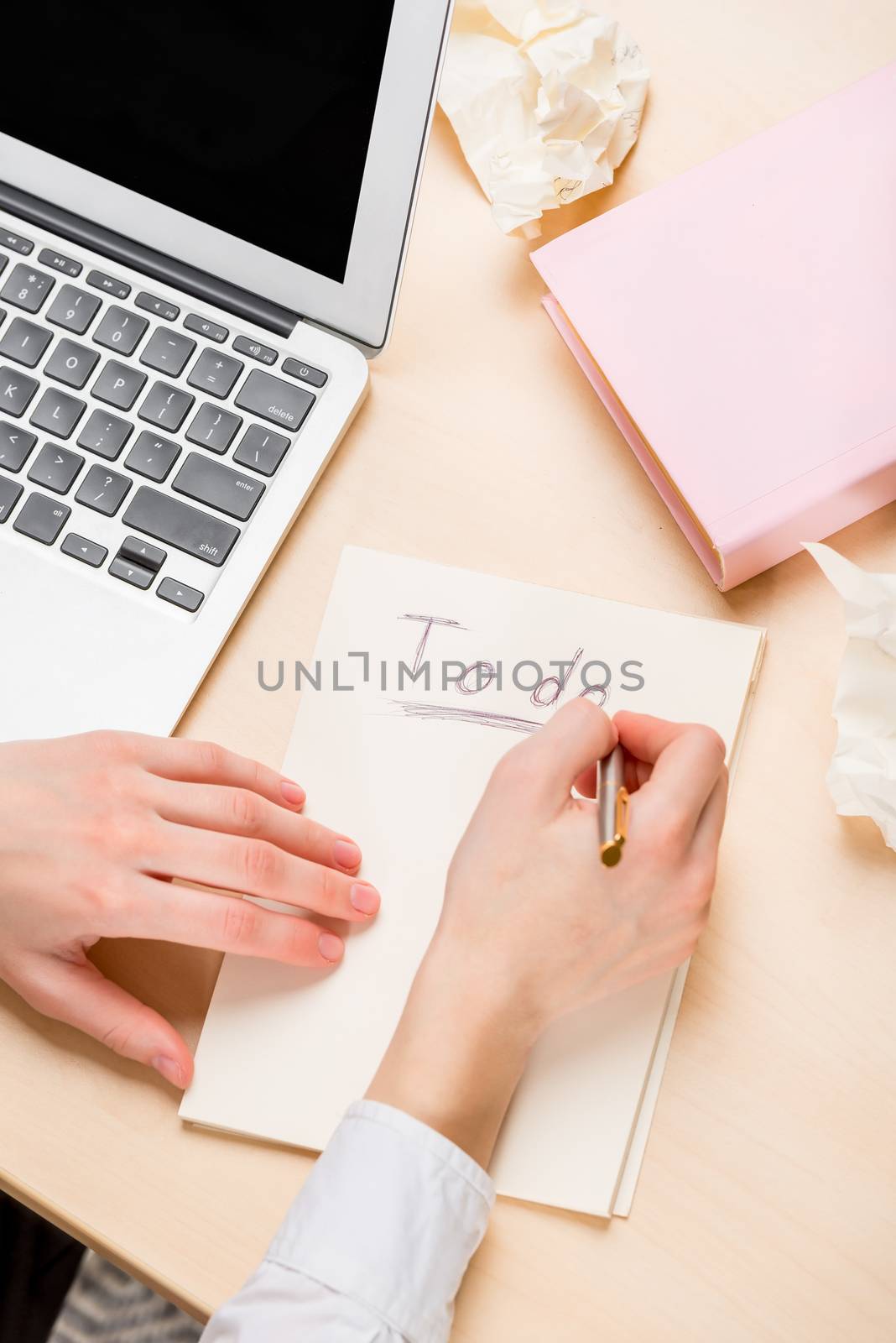 Female hands write information in a notebook with a pen view fro by kosmsos111