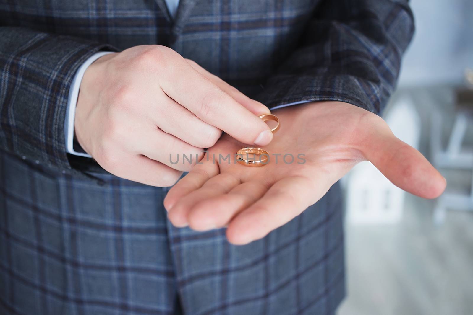 Close-up of elegance man hands with ring, and cufflink