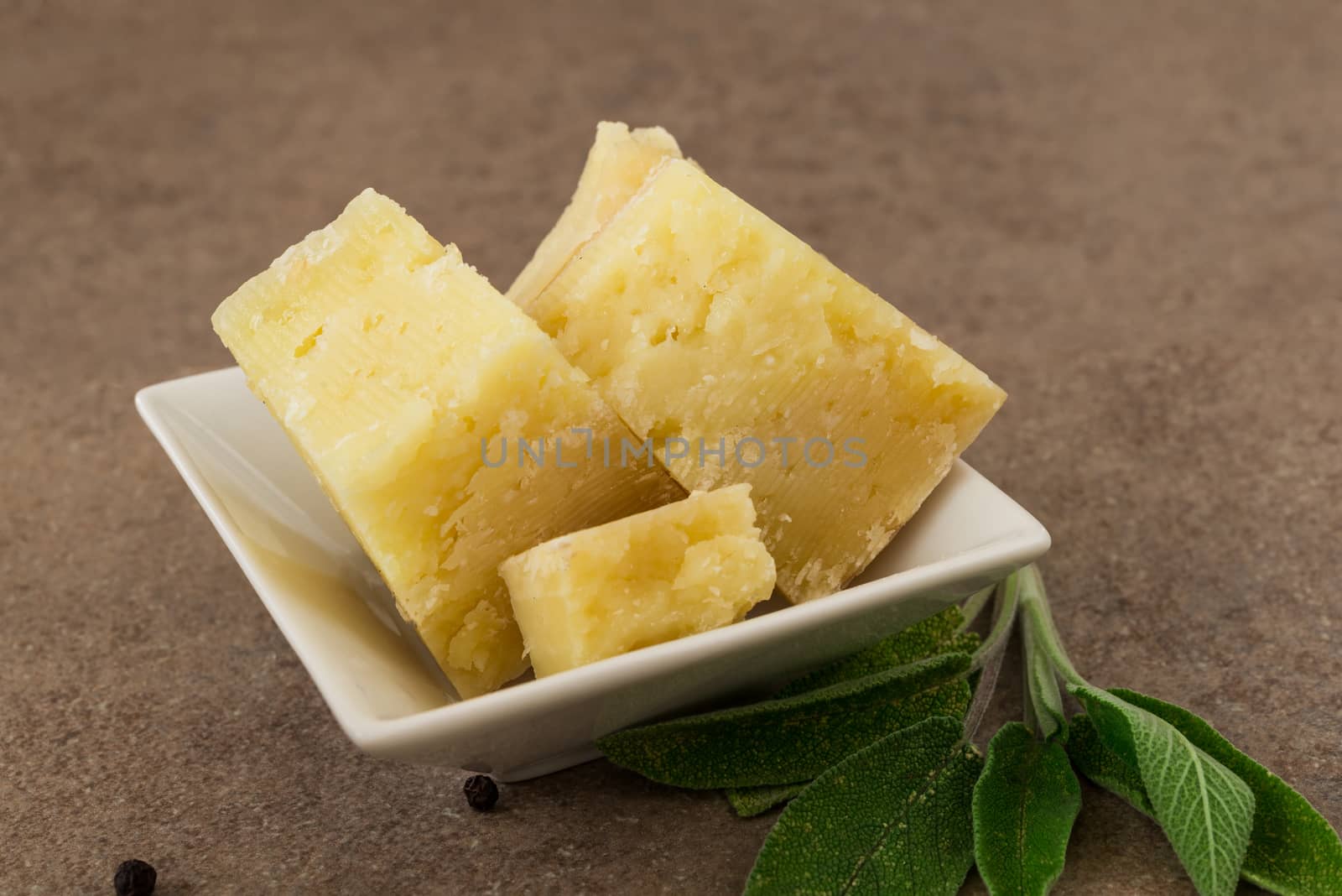 Seasoned cheese in a white bowl