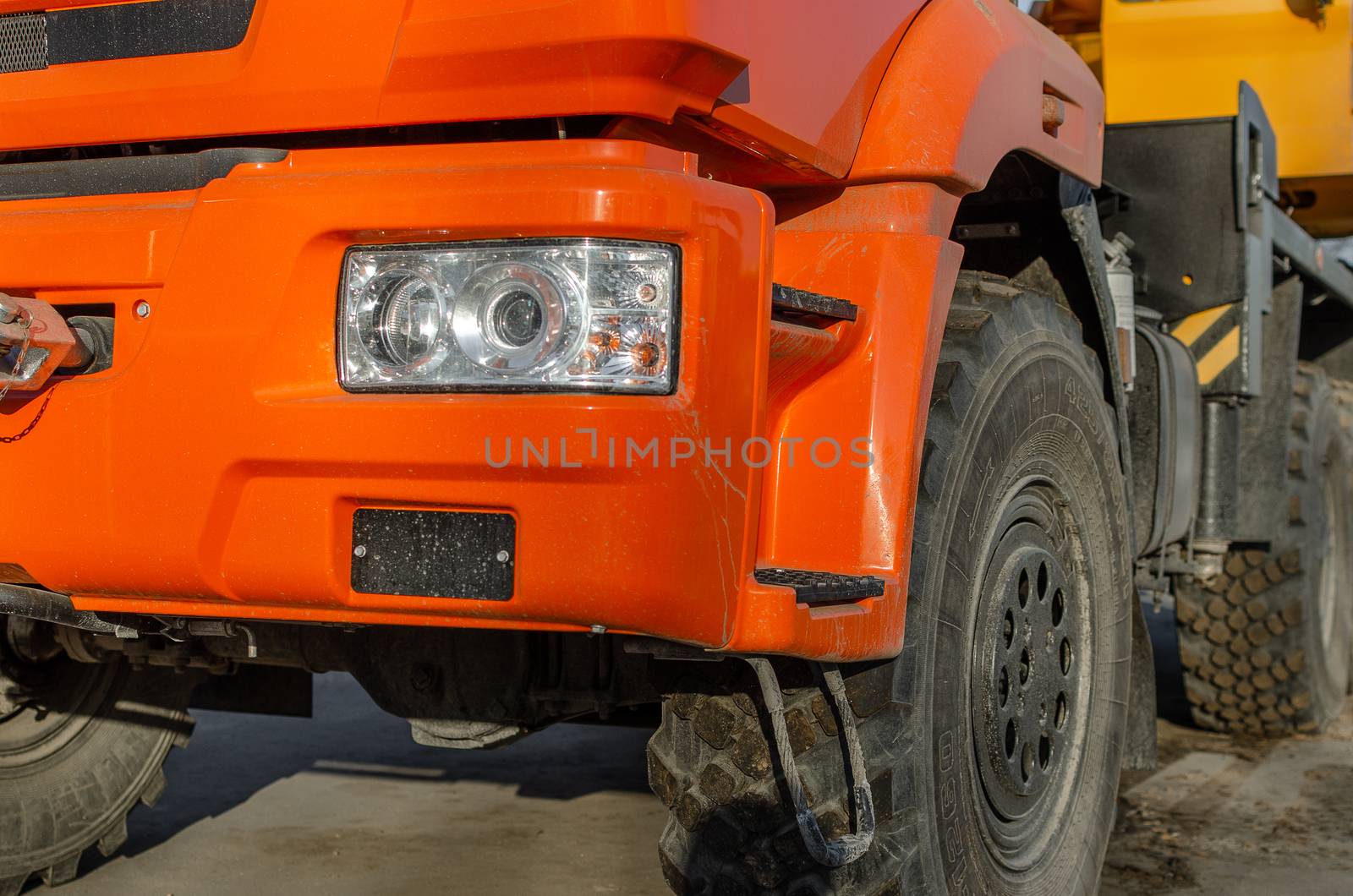 New road-construction equipment outdoors on the exhibition
