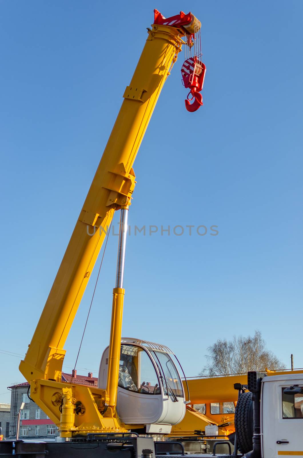 New road-construction equipment outdoors on the exhibition