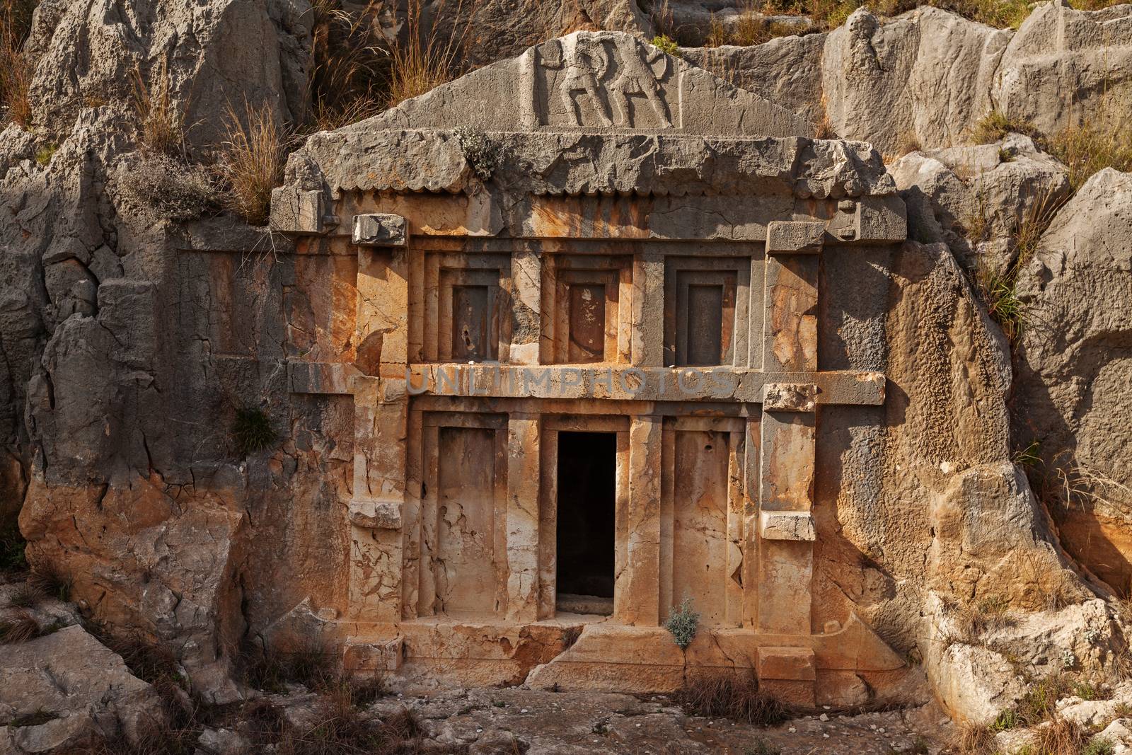 Tomb carved in rocks in ancient lycian necropolis in Mira, Demre, Turkey