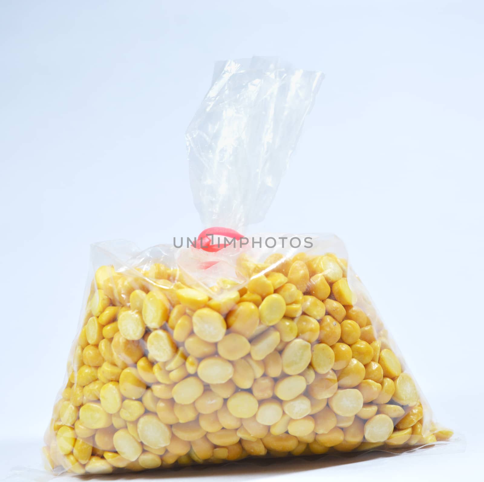 Full of Arhar or masoor Dhal or Toor Dal Pigeon Pea in bag by lakshmiprasad.maski@gmai.com