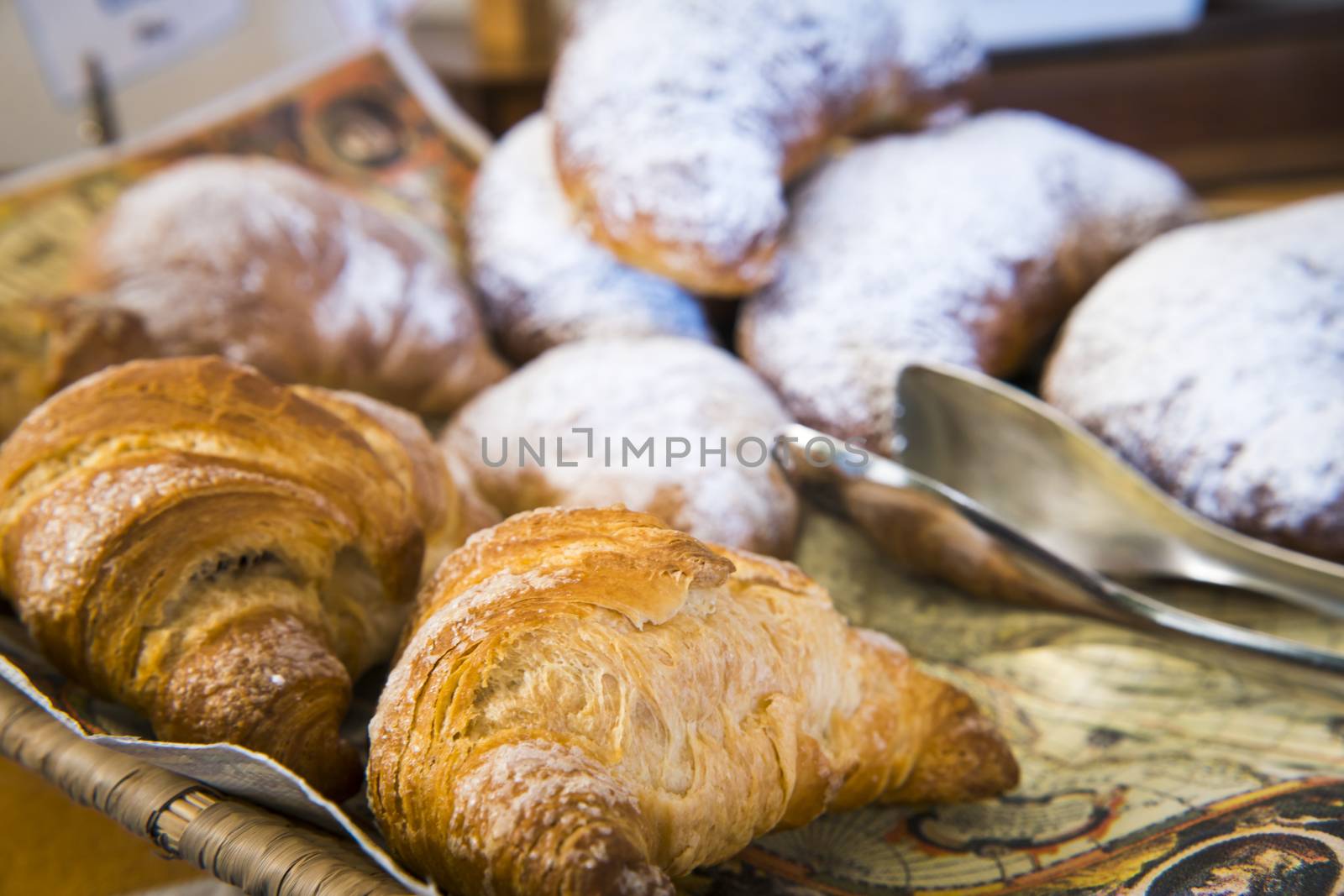 A close up of breakfast croissant.