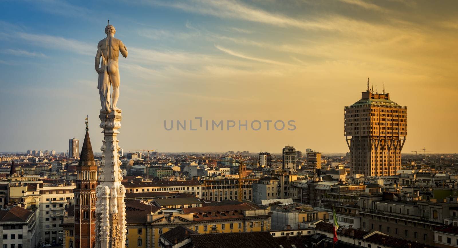 Skyline of Milan, Italy at sunset. View from the Roof Terrance of Duomo Di Milano.