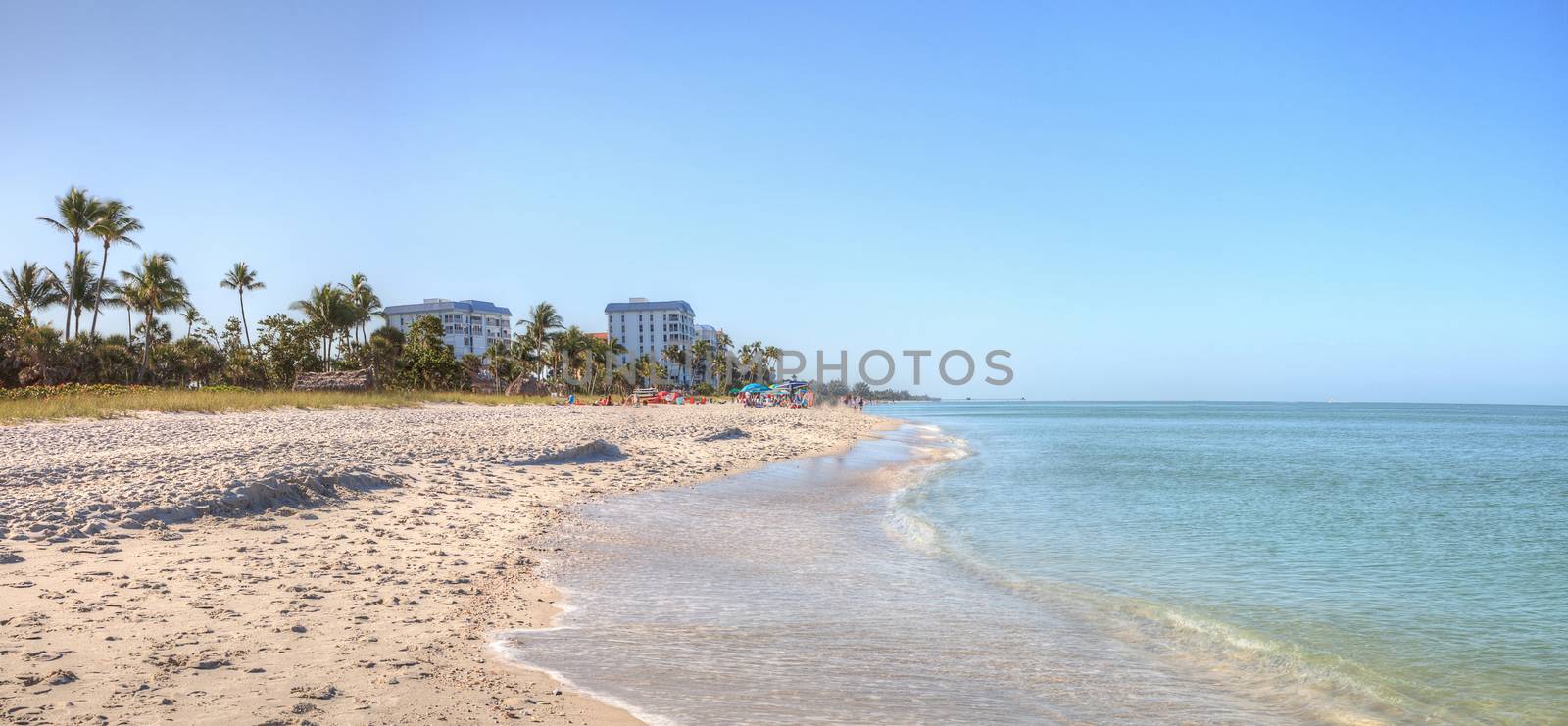 Clear blue sky over Lowdermilk Beach in Naples, Florida