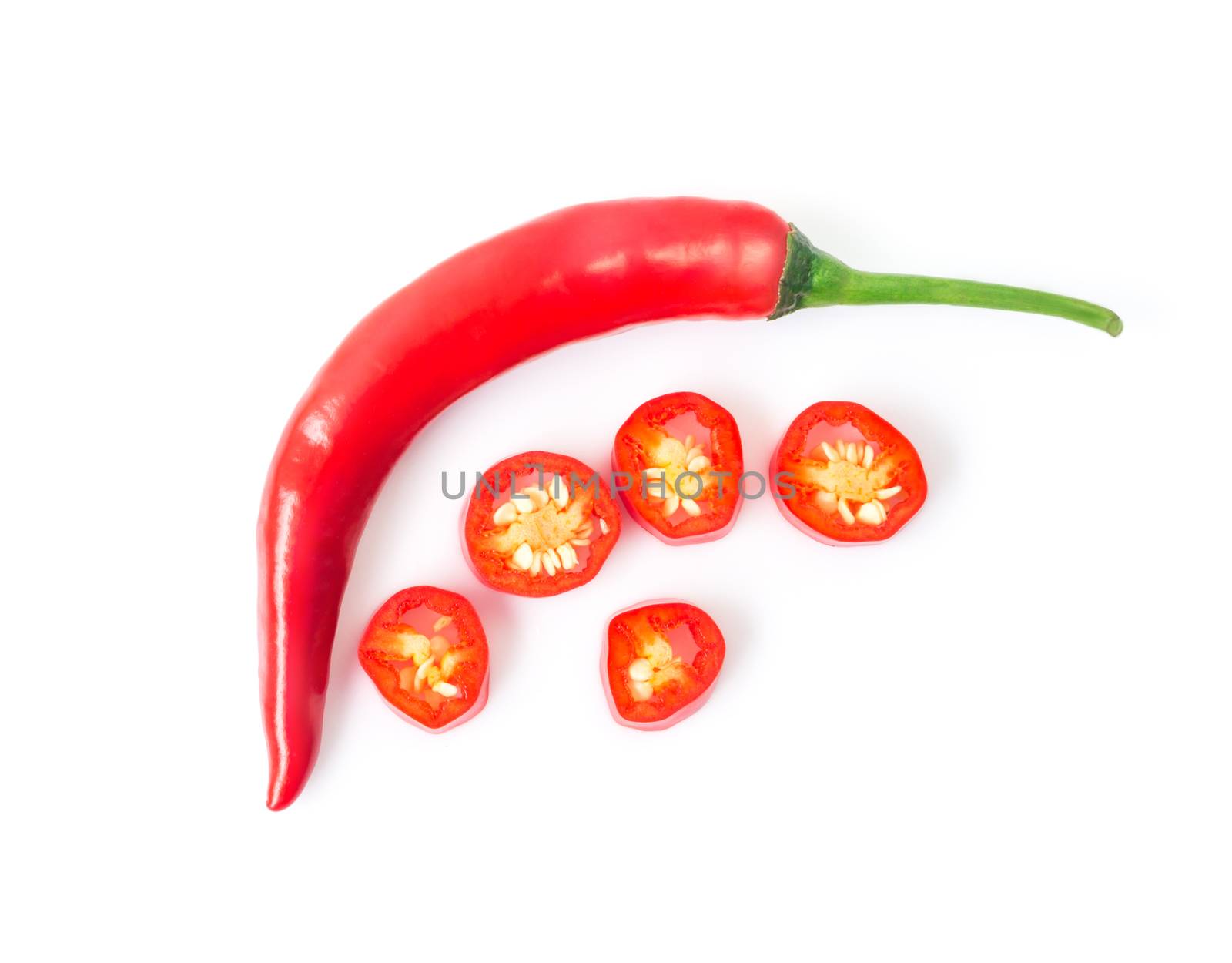 Closeup top red chili pepper with sliced on white background, raw food ingredient concept