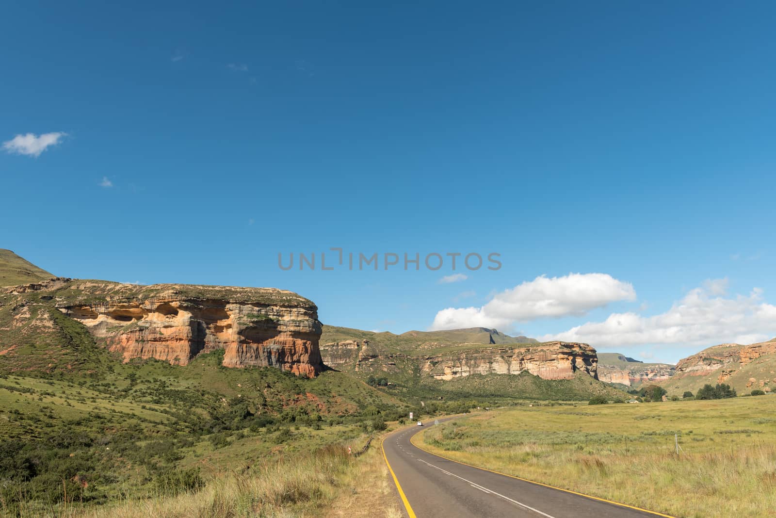 The road and landscape between Clarens and Golden Gate in the Free State Province of South Africa