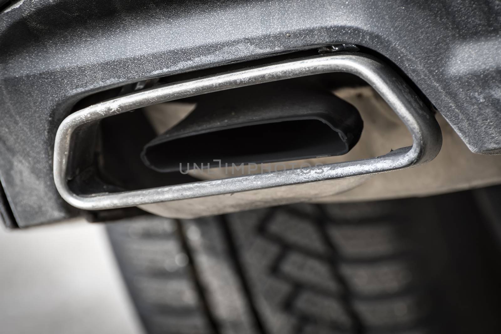 Close image of a car exhaust