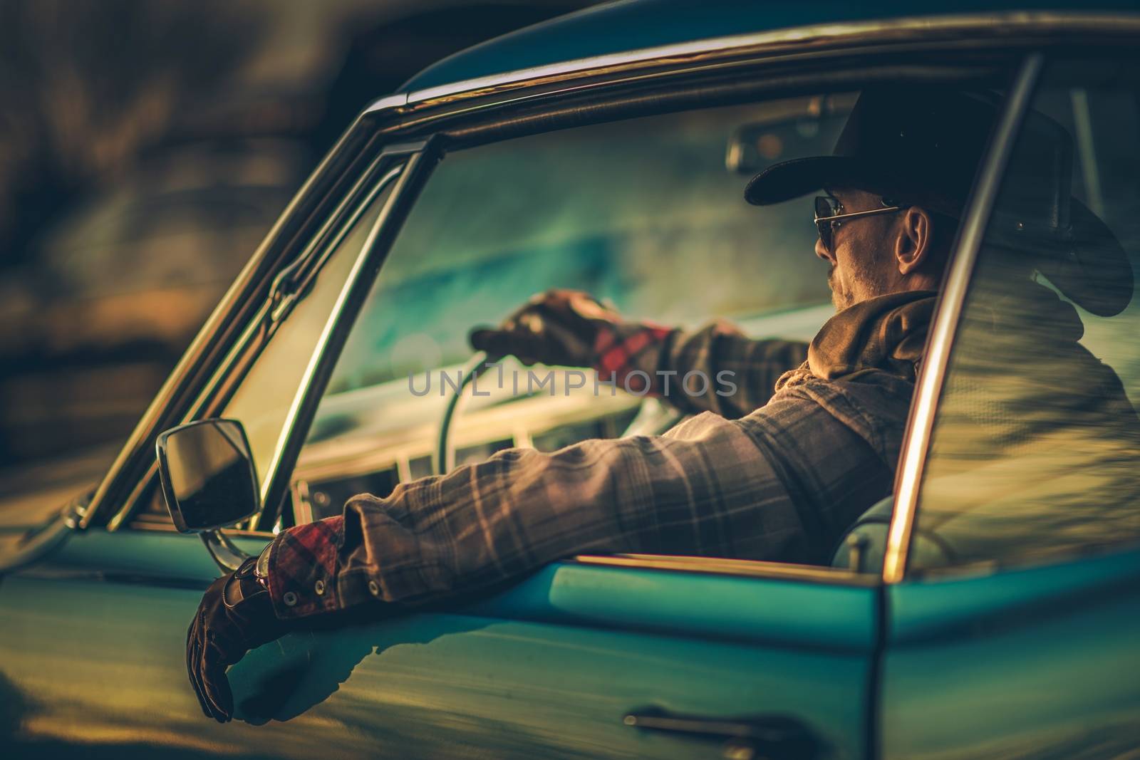 Cowboy Muscle Car Drive. Caucasian Men in His 30s Wearing Stylish Western Wear Taking Road Trip in His Classic Car. West American Ride in Style.