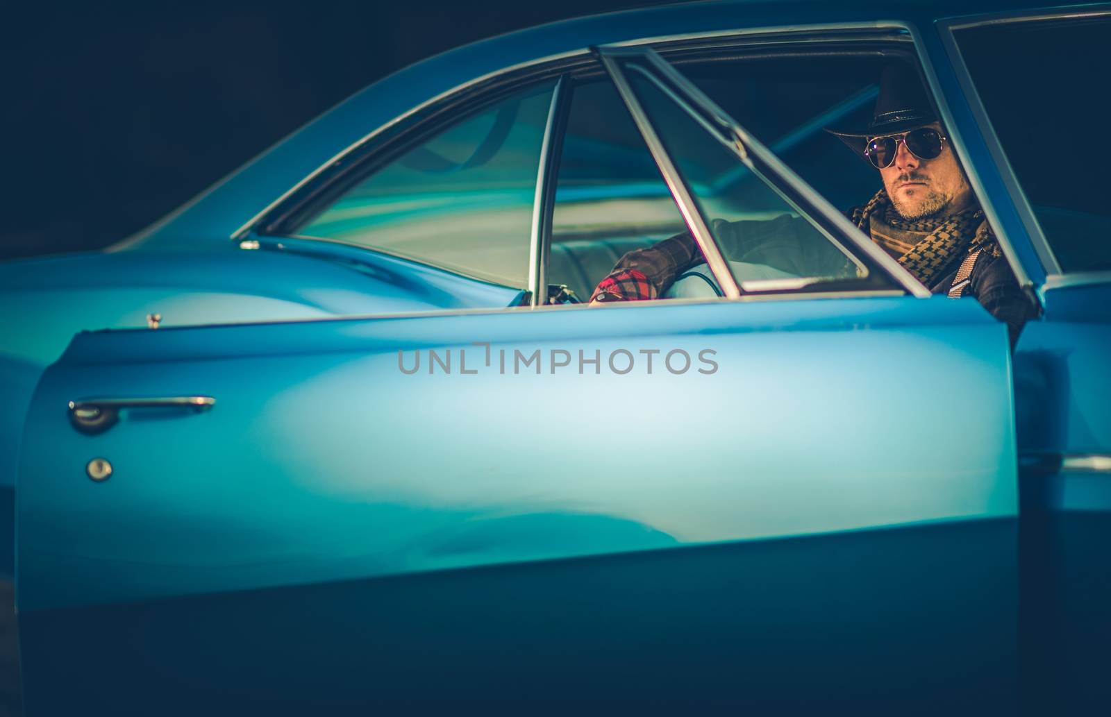 Texas Cowboy Classic Ride. Caucasian Men in His 30s Wearing Western Clothes Included Cowboy Hat Seating in His Powerful Classic Muscle Car.