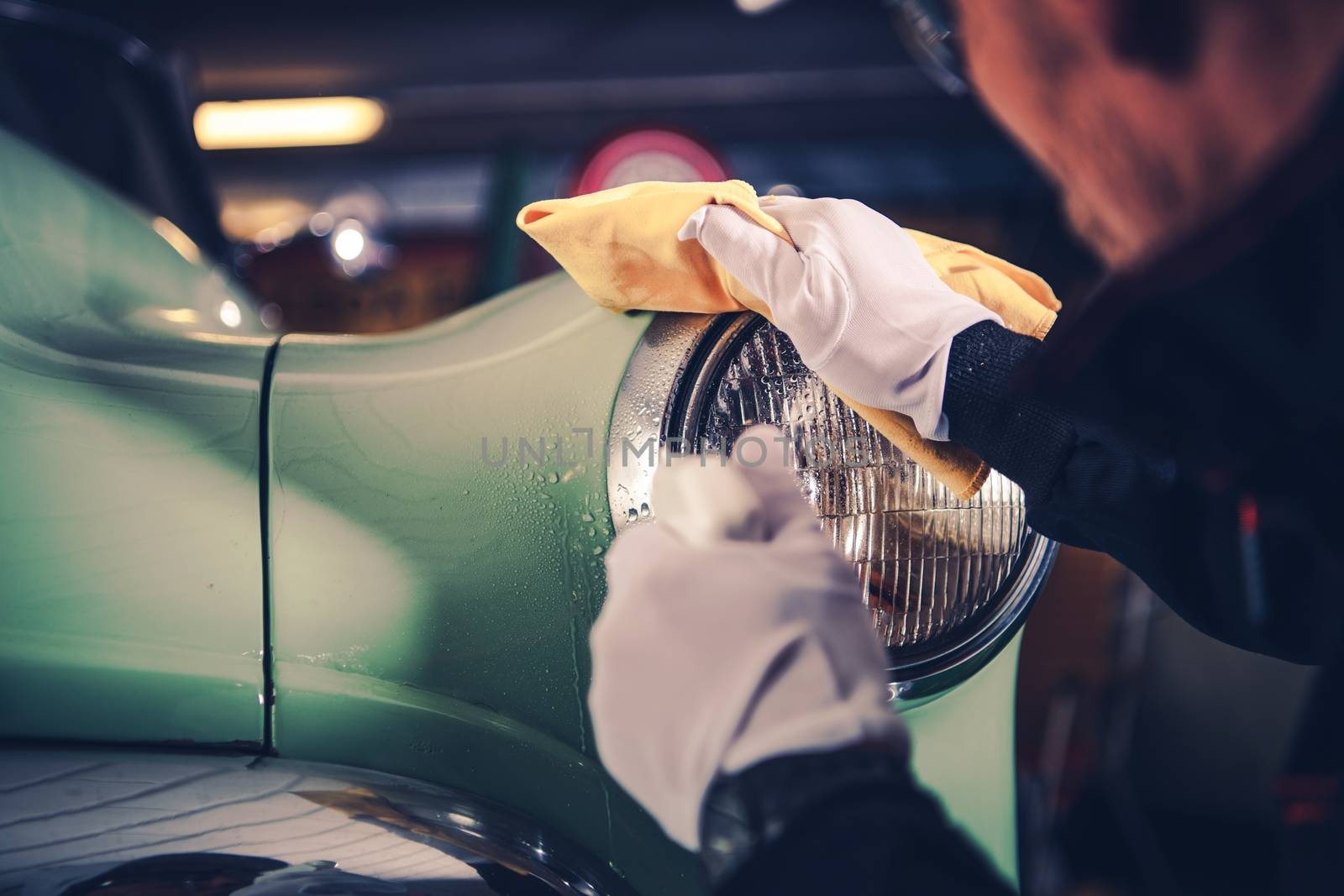 Retro Car Detailing. Classic Car Cleaning by Professional Vehicle Cleaner.