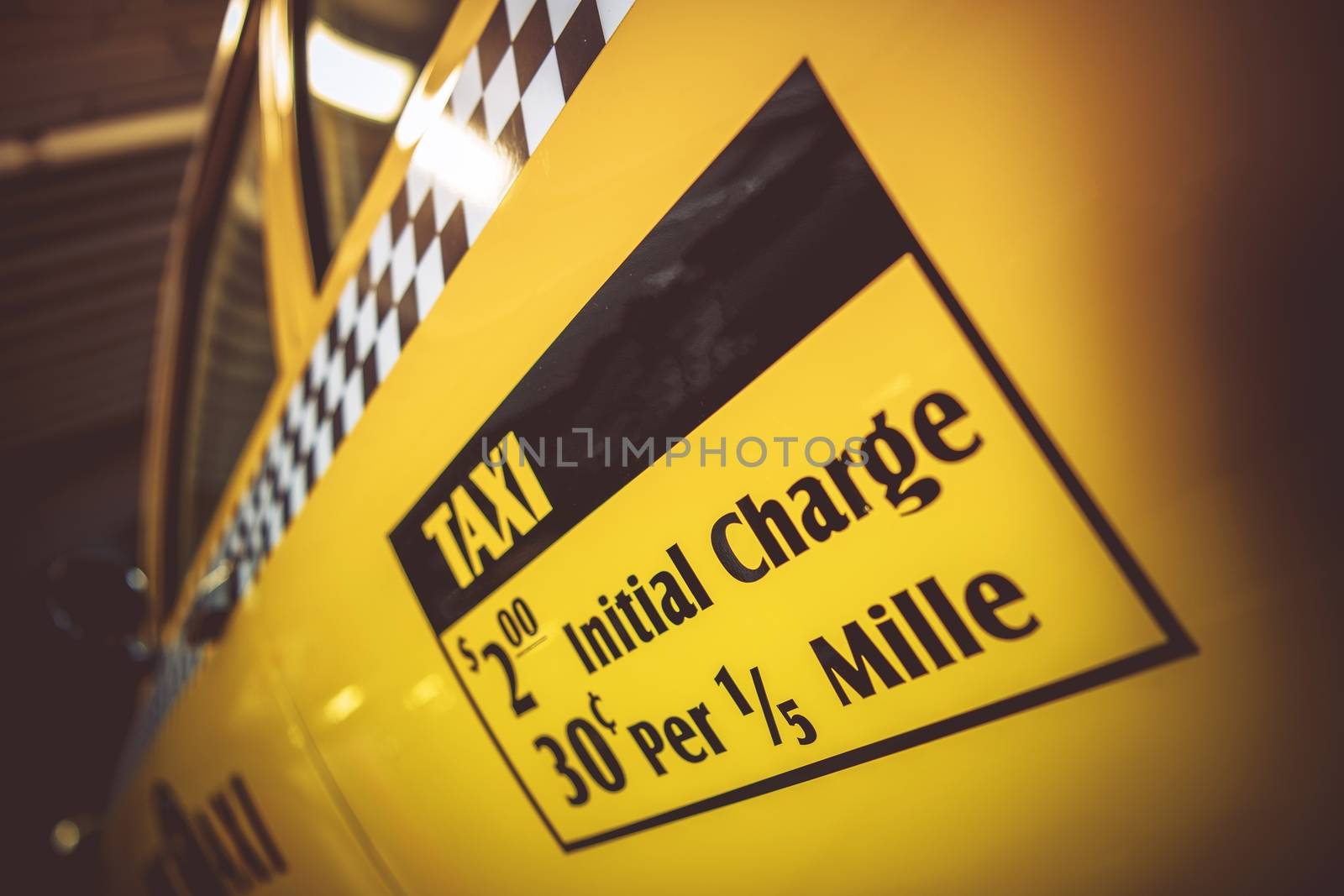 Taxi Fare Charge Sticker on the American Yellow Cab. Initial Charge. Urban Transportation Concept.