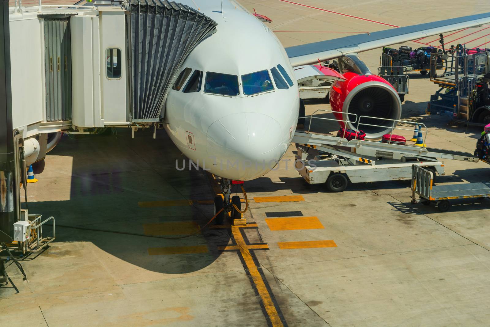 Passenger aircraft during loading and refueling                  by JFsPic