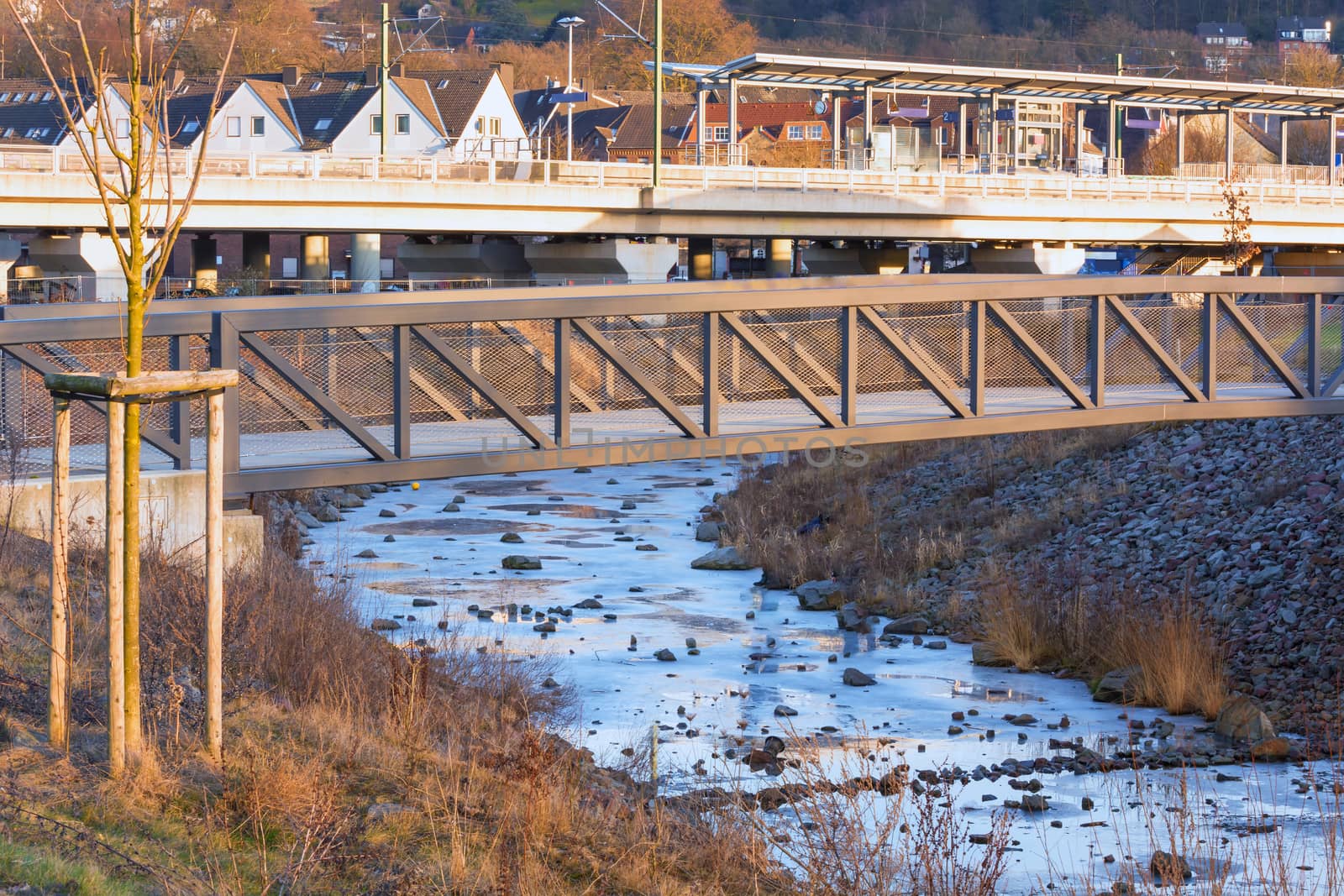 Bridge over the frozen river Ruhr in winter