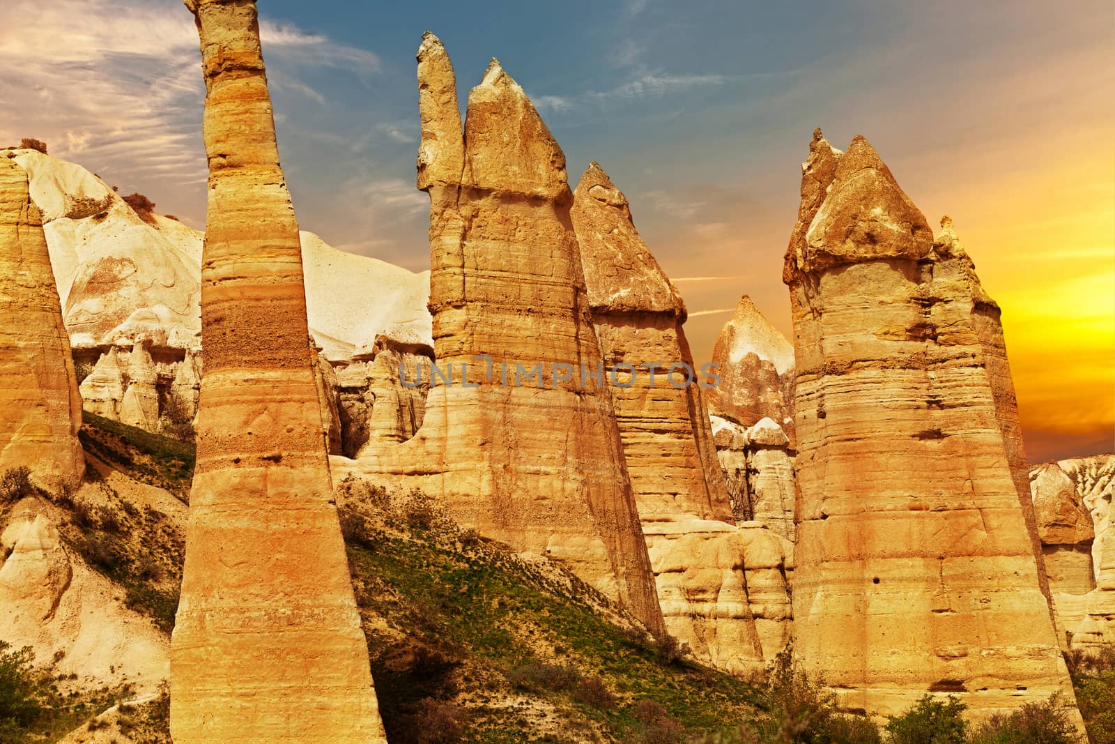 Cylindrical stone cliffs in valley named Love valley near Goreme, Turkey