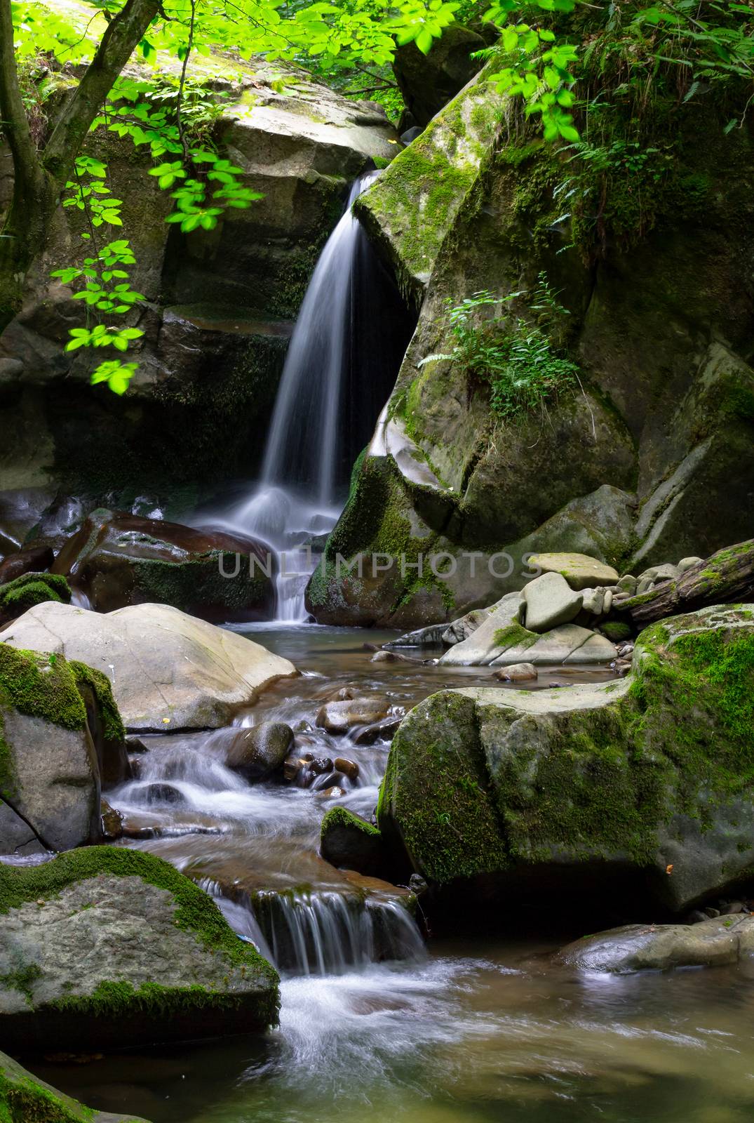 small waterfall among the rocks by Pellinni