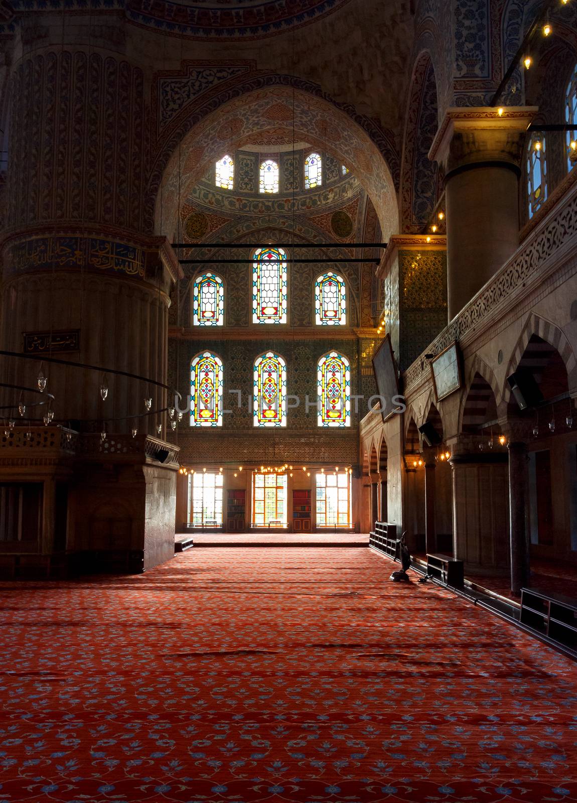 Istanbul, Turkey - 18 AUG, 2015: interior of Blue Mosque in Istanbul. beautiful stained-glass window. popular tourist place