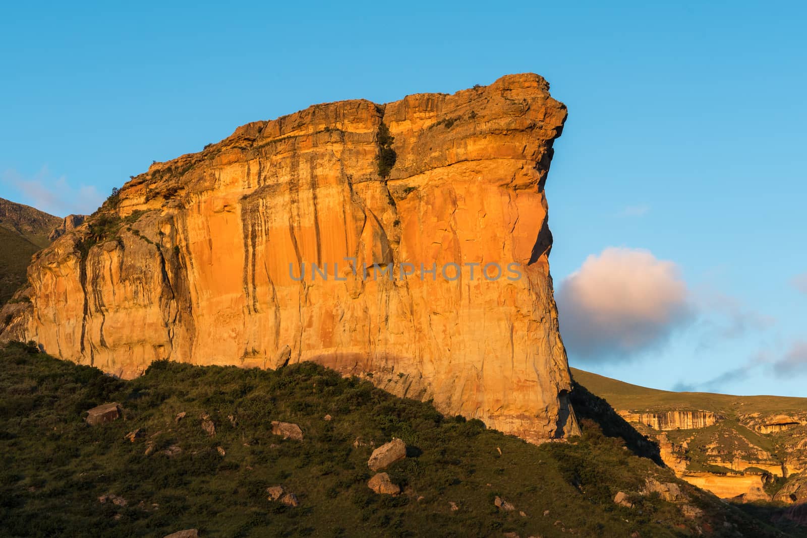 The Brandwag (sentinel), a sandstone cliff, during sunset at Golden Gate in the Free State Province of South Africa