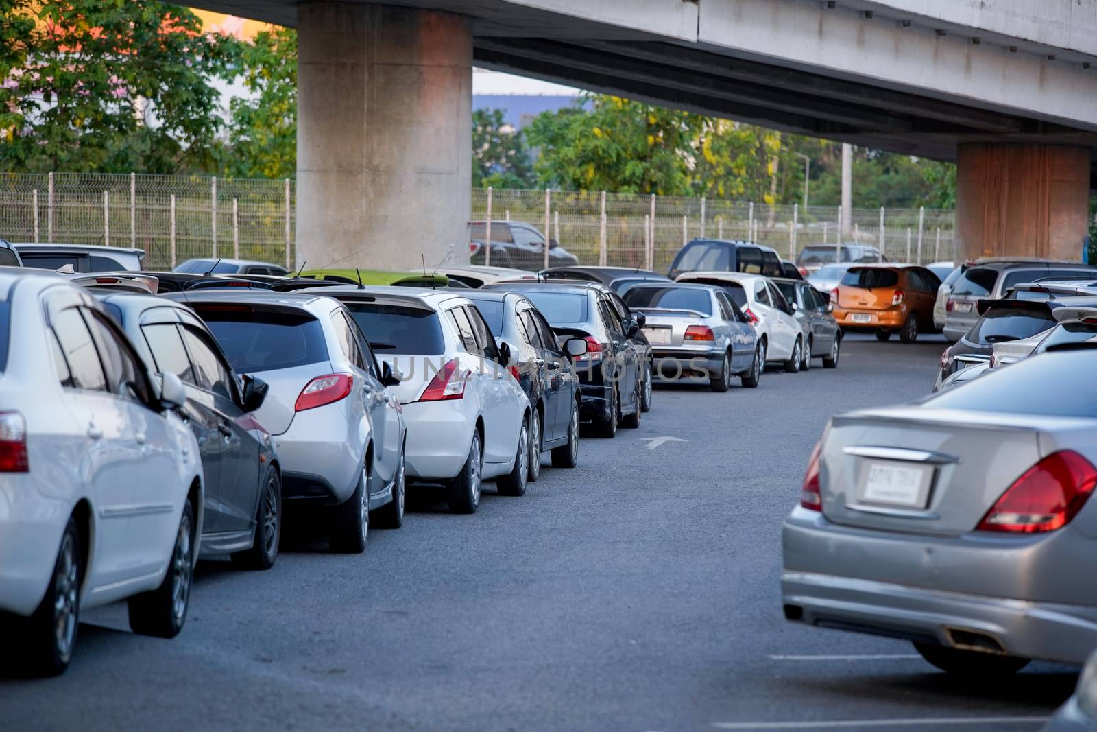 row of cars in parking