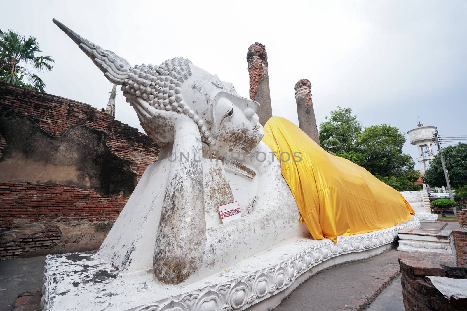 Sleep buddha statue in Wat Yai Chaimongkol, Ayutthaya, Thailand. by antpkr