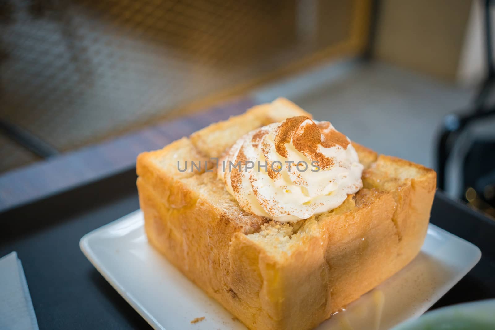 Korean styled cinnamon and butter toast with cream.