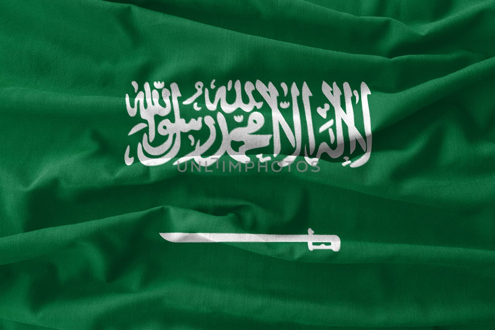 Saudi Arabia flag painting on high detail of wave cotton fabrics by stockdevil