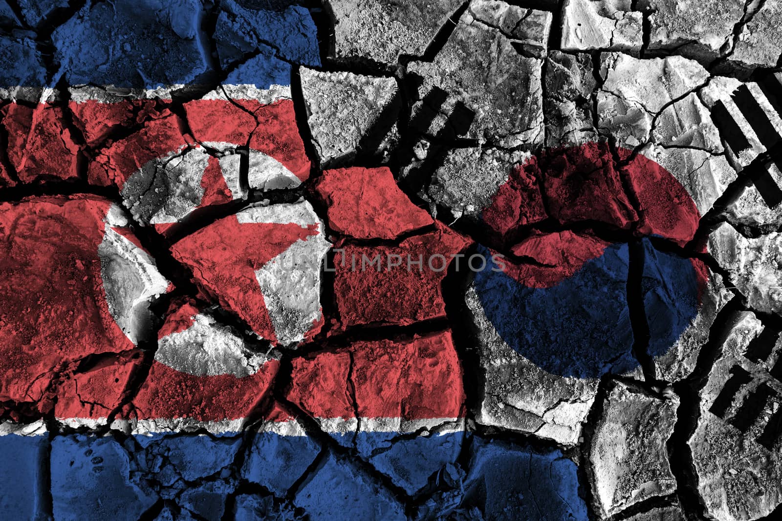 North and south korea flag on cracked ground . Confliction and crisis concept by stockdevil