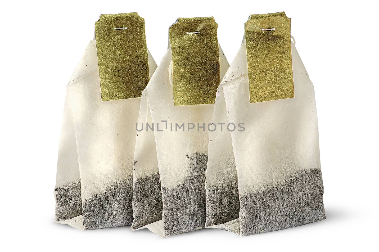 Three tea bags with labels isolated on white background