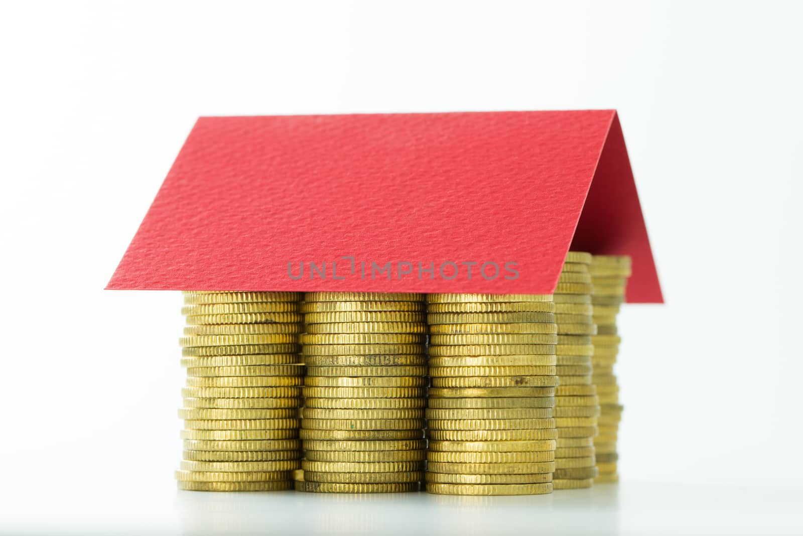 House made from coins and red color roof by Kenishirotie