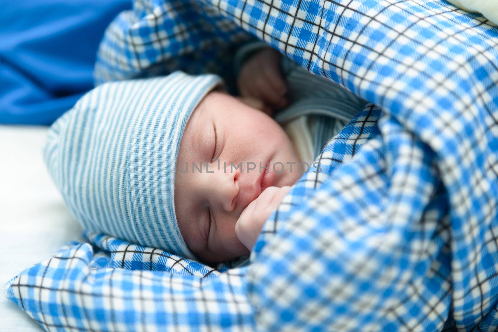 Cute Eurasian newborn baby sleeping